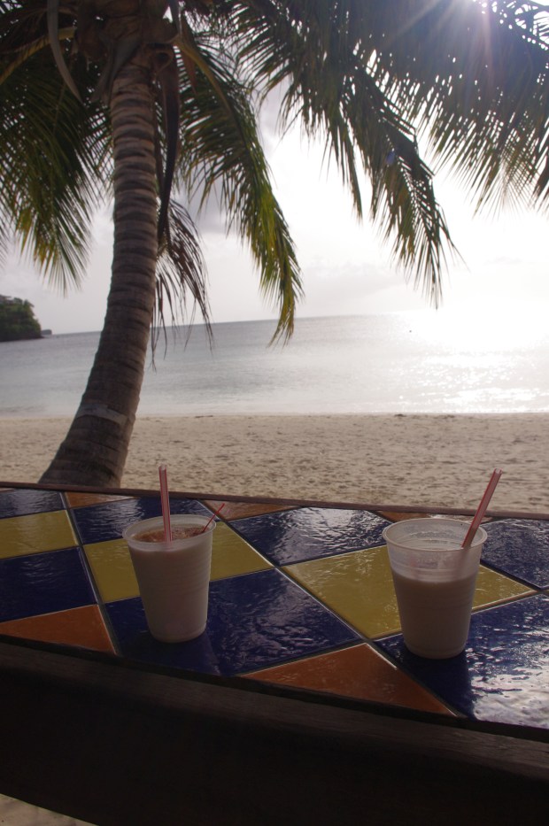Piña coladas with fresh coconut and nutmeg
